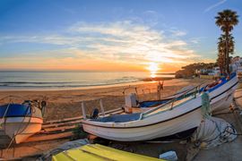 Europe Holidays - Portugal, Algarve - Boats in warm sunset light at sunset