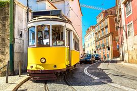 Europe Holidays - Portugal, Lisbon - vintage-tram rolling down the cobalt street