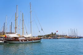 Europe Holidays - Turkey Holidays, Bodrum - moored sailboat with castel view