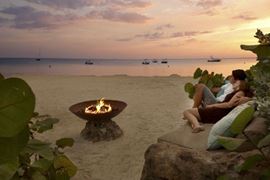 Tropical Honeymoon Beach Firepit at Sunset